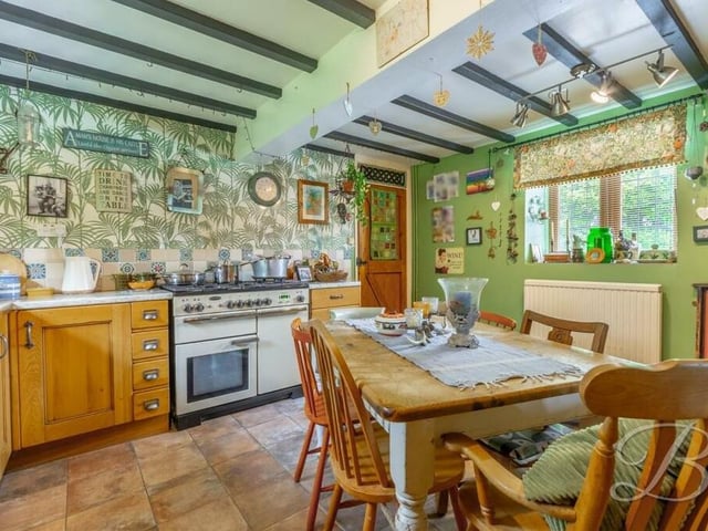 Our stroll through the £350,000 Warsop home begins in this fantastic breakfast kitchen, which oozes rustic charm. It comes complete with a range of matching units and cabinets with work surfaces over and an inset Belfast sink with drainer.