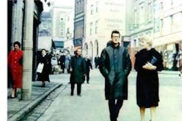 Buddy Holly walking the streets of Chesterfield in 1958.