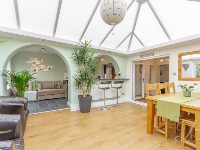 The orangery is a spectacular space and very attractively presented. The floor is laminated and there is a lot of relaxing living space.