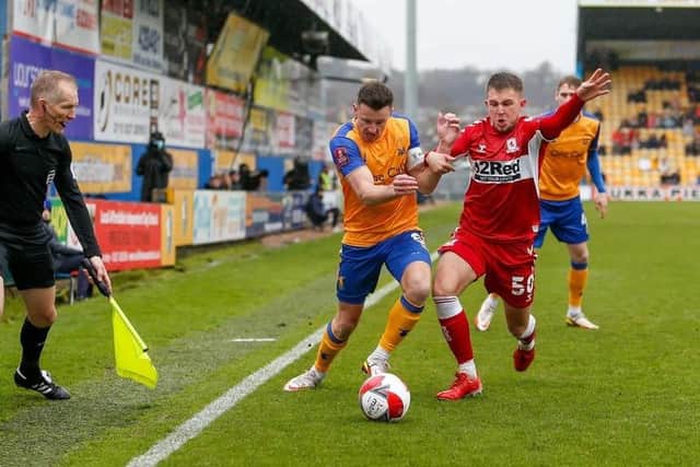 Action from Stags' FA Cup, Third Round tie against Middlesbrough in January as Ollie Clarke battles for the ball.