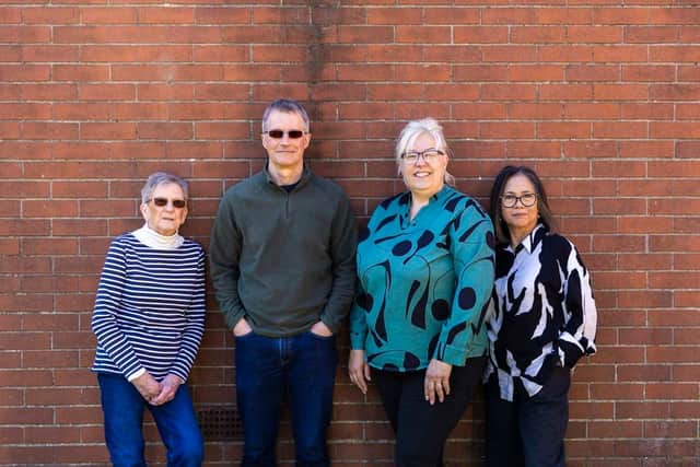 Announcing the launch of the new website are, from left, Maureen Cooper (befriender co-ordinator), Mark Barrable (treasurer), Rachel Laurenson (manager), Melanie Derbyshire (transport co-ordinator). Photo: Gemma Wilks.