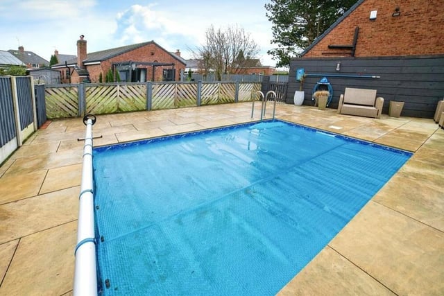 Arguably the jewel in the crown at the £580,000 bungalow -- and what you've been waiting for -- is the stunning swimming pool within the back garden.