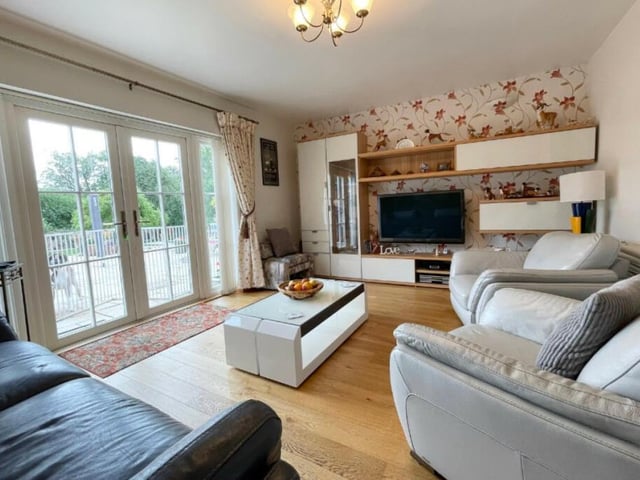 Into the main body of the £650,000-plus house now and here is the bright and spacious lounge, with its oak floor and large French doors that lead to the garden.