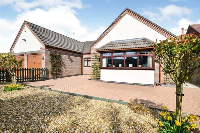 Marvel at this three-bedroom, detached bungalow on Emerald Grove, Kirkby, which is on the market for £500,000 with estate agents Bairstow Eves.