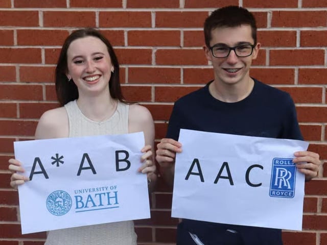 Hall Park Academy students Freya Meakin and Fynnlay Bardgett showing off their amazing grades in 2023.