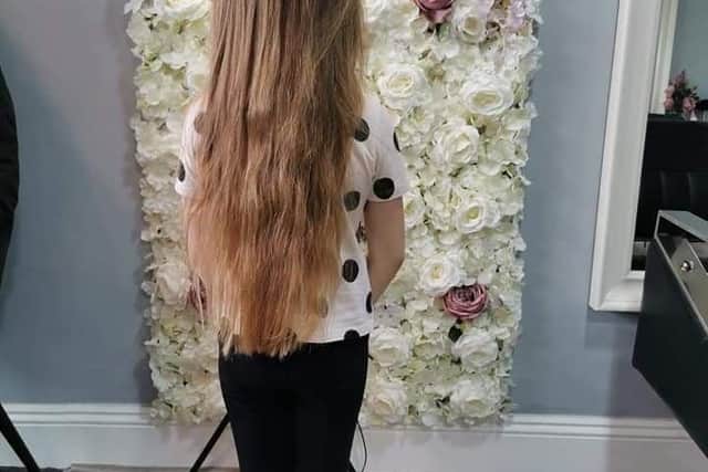 Willow Phillips with her long hair just before her haircut