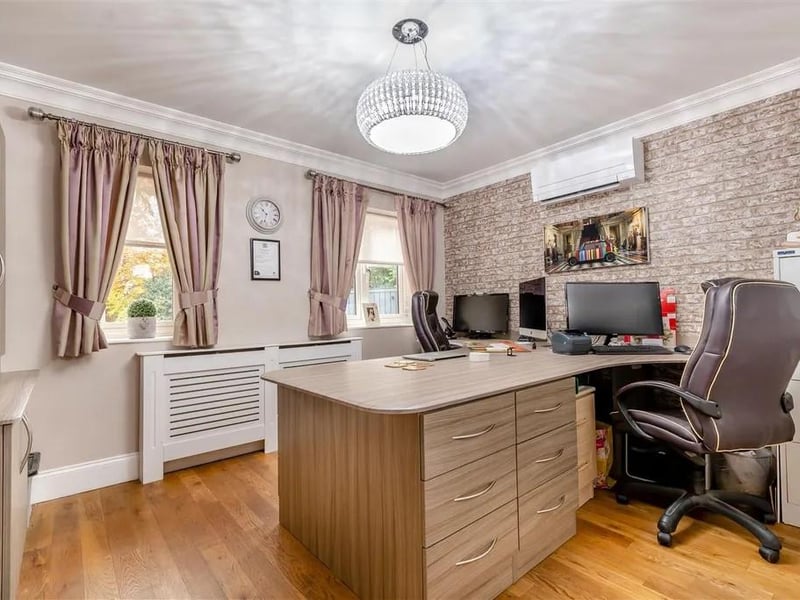 Ideal for those wanting a home office this space offers extensive fitted furniture comprising a large central desk with fifteen drawers beneath which can accommodate two people. There is matching fitted wall and base cabinets across one wall to each side of the door, oak floor, radiator, coving to ceiling, air conditioning unit and two double glazed windows to the front elevation.