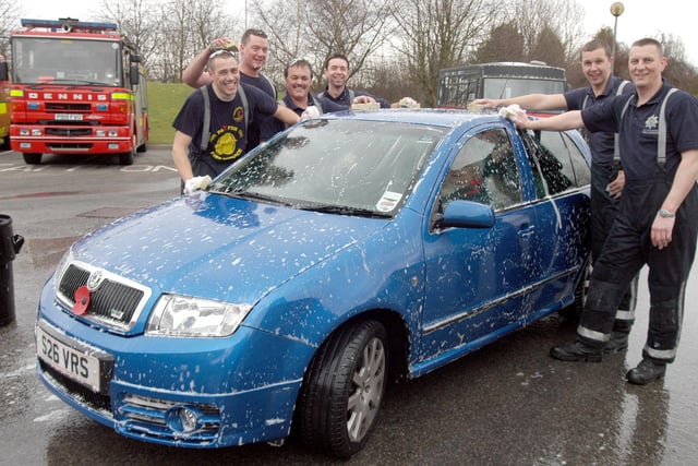 Firefighters who took part in a car wash at Kirkby Fire Station to raise money for the Fire Service Benevolent Fund