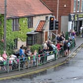 It was a bit wet - but residents still came out to support the cyclists.