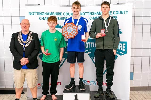 Thomas Swales picks up his 50 fly gold together with the Junior County Champion trophy.