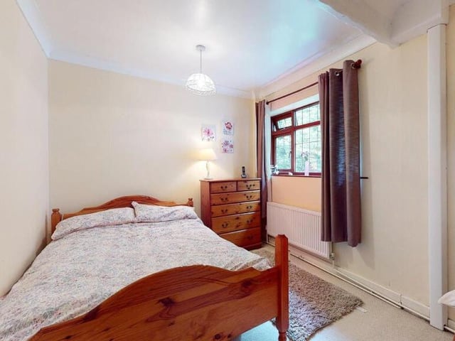 This cosy space is another of the bedrooms at the £400,000-plus bungalow in Selston.