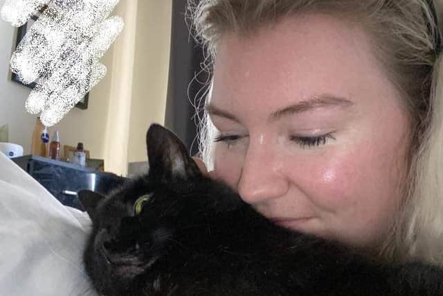 Chloe Patterson, 25, with Max the cat. Photo: submitted.