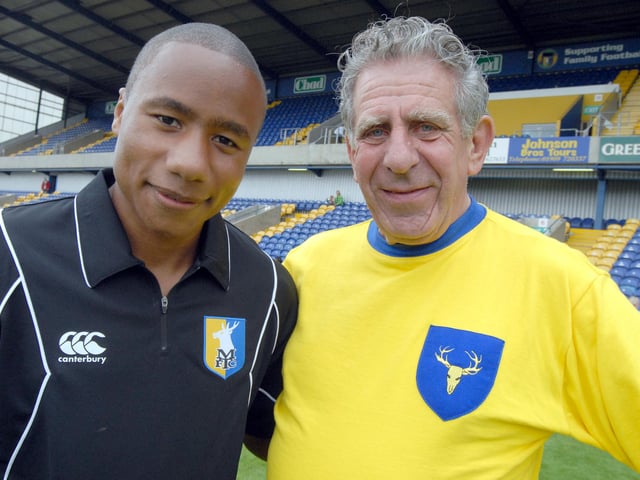 Jonathan D'Laryea pictured with Stags fan Dave Palfreman, from Leicester, who is wearing a Stags shirt from the 1960's at Field Mill during Sunday's Open Day. Dave first visited Field Mill in 1946 at the age of eight.
