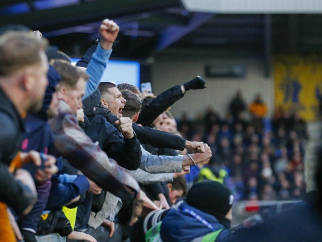 Mansfield Town fans in the stands at AFC Wimbledon.