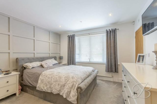 Bedroom number two also faces the front of the Lansdowne Avenue home, and has access to an en suite shower room. Other features are decorative panelling, a carpeted floor, downlights and space for storage drawers.