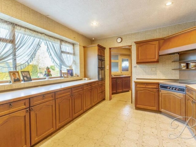 The generously-sized kitchen is our next stop. It comes complete with an extensive range of matching wall and base units with complementary worktop over and inset sink with drainer and mixer tap.