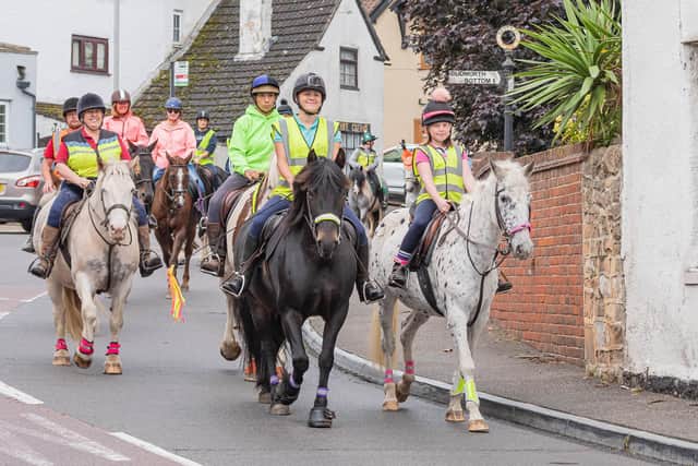 Sarah Howarth on her horse, Bella, and daughter Phoenix, aboard her pony, Dotty, at the head of last year's awareness ride as it wends its way through Blidworth.