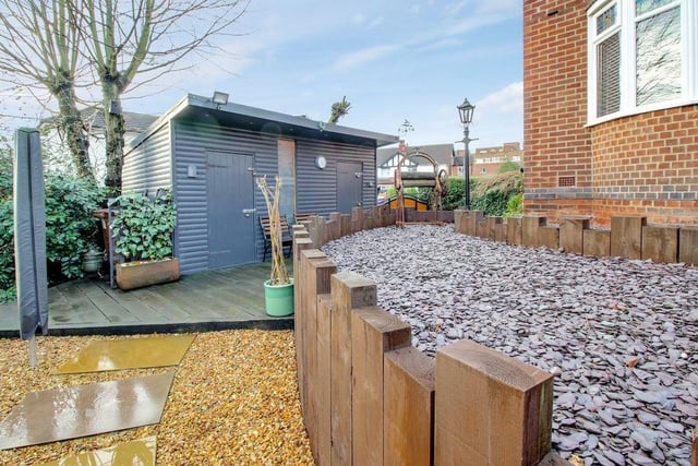 The current owner of the house has built this impressive shed or 'man cave', which sits neatly in the front garden.