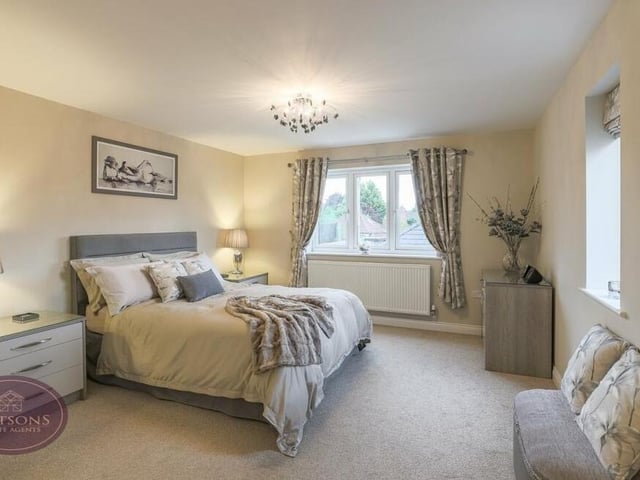 The master bedroom is a marvellous space, flooded by natural light from the front and side of the Selston property. It has access to both a dressing room and an en suite shower room.