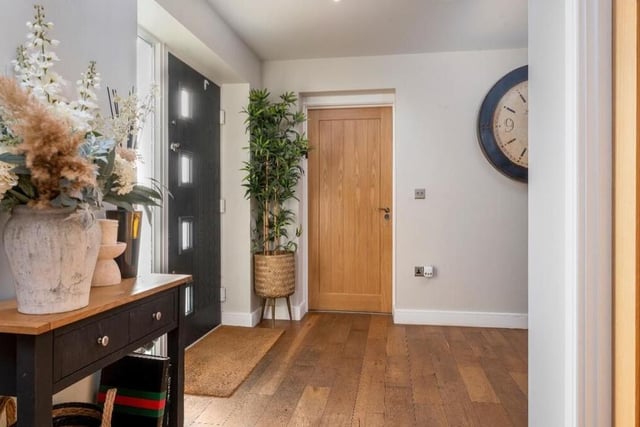 The entrance hall provides a suitable fitting welcome into the £470,000 Skegby home, with its solid oak floor setting the tone for the rest of the ground floor. It also features LED spotlights to the ceiling.