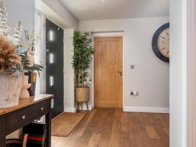 The entrance hall provides a suitable fitting welcome into the £470,000 Skegby home, with its solid oak floor setting the tone for the rest of the ground floor. It also features LED spotlights to the ceiling.