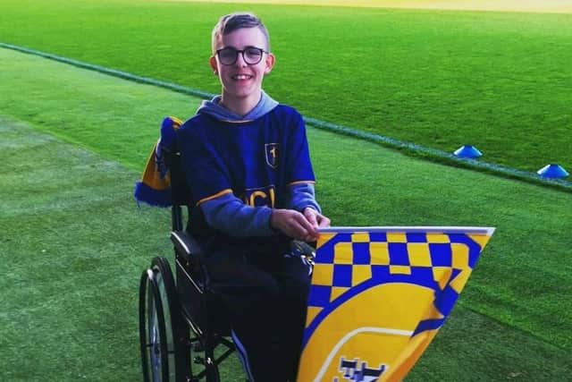 Jak is a 15-year-old Mansfield Town football club fan.