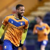 Jordan Bowery celebrates scoring Mansfield Town's third goal against Cheltenham Town. (Photo by Alex Pantling/Getty Images)