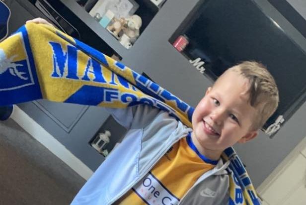 Memories of a life-time for this young fan.