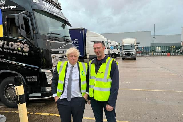 Boris Johnson with one of Taylor’s drivers Martin Rehm.
