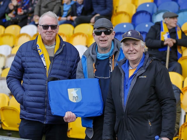 Mansfield Town fans ahead of the draw with Sutton United on 25 Mar 2023.