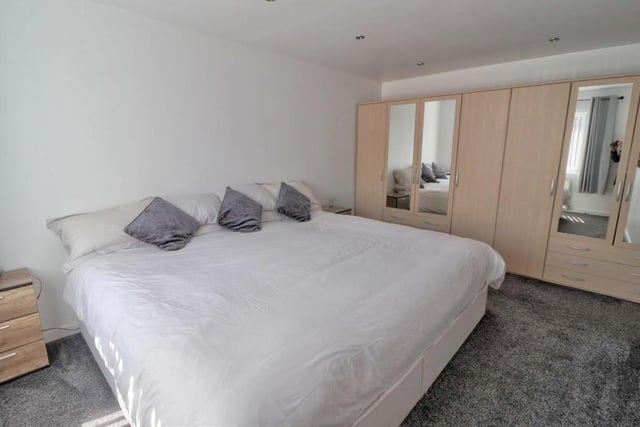 One of the four bedrooms at the Blidworth property is on the ground floor. A good size, it has space not only for a double bed but also wardrobes and storage. The floor has a grey carpet that adds to the room's cosiness.