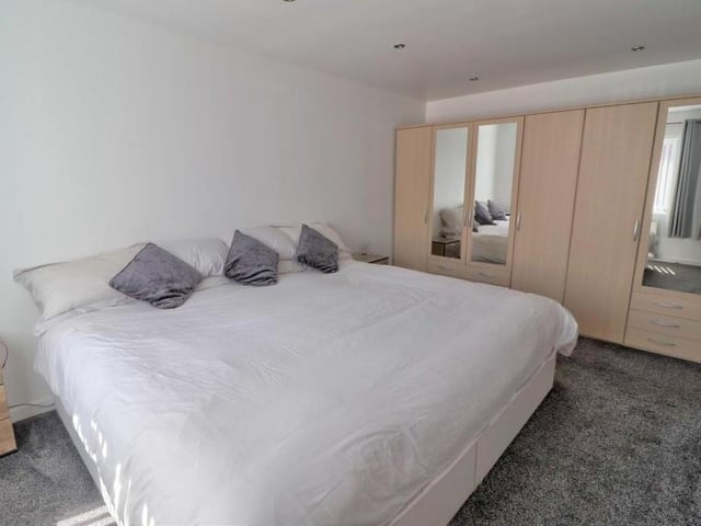 One of the four bedrooms at the Blidworth property is on the ground floor. A good size, it has space not only for a double bed but also wardrobes and storage. The floor has a grey carpet that adds to the room's cosiness.