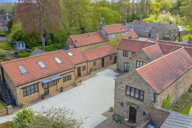 Let's move across the courtyard now to the annexe, via this overhead drone shot.