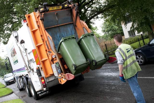 A Mansfield Council waste crew and lorry.