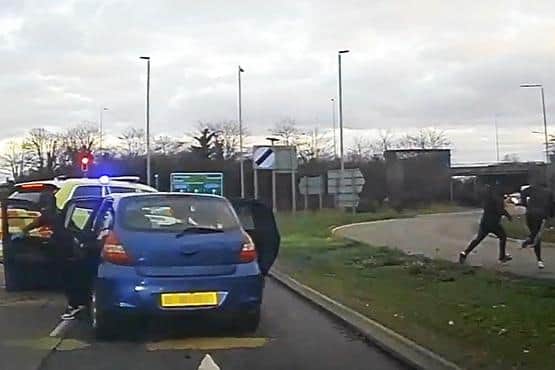 Police dashcam captures the moment the four teenagers tried to flee from the stolen vehicle before they were caught. Photo: Nottinghamshire Police