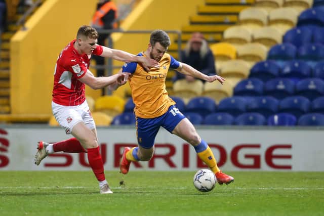 Rhys Oates pushes forward against Swindon. Photo credit - Chris Holloway / The Bigger Picture.media