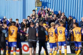 Stags celebrate victory at Barrow last month.