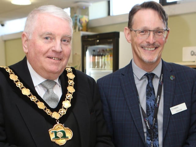 Nottinghamshire County Council chairman, Coun Mike Quigley MBE, and Peter Gaw of Inspire, cut the ceremonial cake