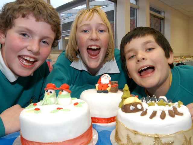 Winners of the Braken Hill School Cake competition in 2007 in Kirkby. From the left are Kim Higginson 1st prize, Elizabeth Atkinson 2nd prize and Michael Riley 3rd prize. Asda at Sutton provided the ingredients and a prize for the winner.