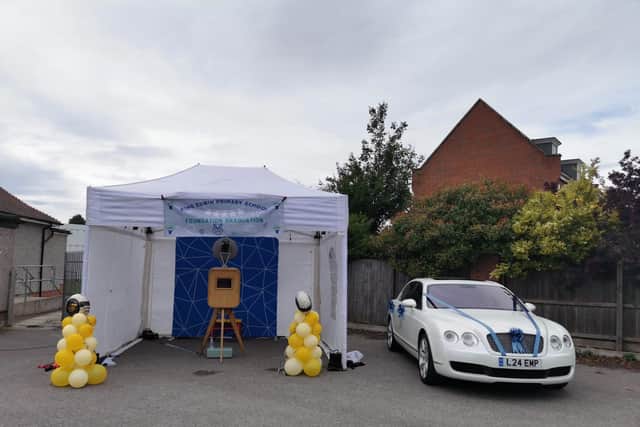 Students aged four and five got the chance to have a picture next to the car and take an instant photo in the booth.