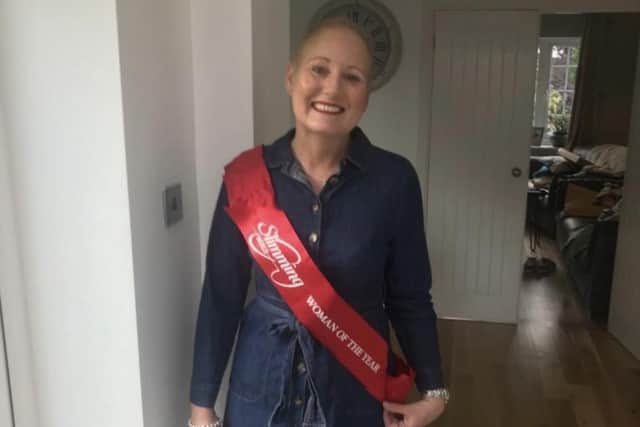 Emily proudly wearing her Slimming World ‘woman of the year’ sash.