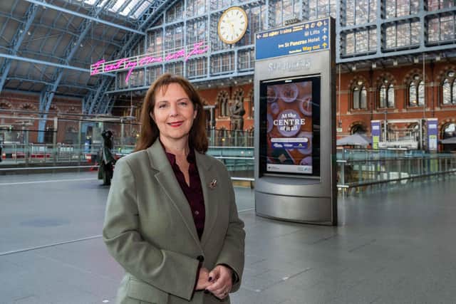 East Midlands Mayor Claire Ward in front of a digital billboard at St Pancras Station in London advertising the East Midlands as a tourist destination. Photo: Submitted
