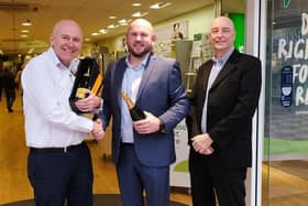 Nigel Davidson (left), is handing over the reigns at Specsavers in Idlewells to Michael Hinder (middle). Also pictured: Stuart Martin, regional manager