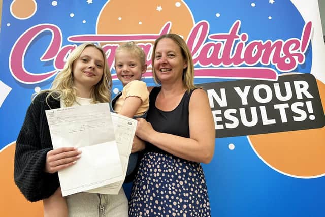 Sophie Orange (left) celebrated her excellent grades with sister Charlotte and mum Terri.