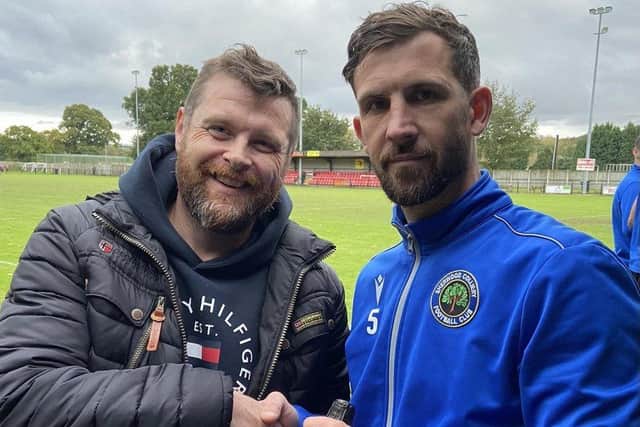 Sherwood man of the match Jake Wright receives his award from match day secretary Andrew Alden.