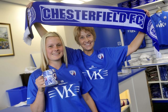 Staff at the new club shop prepare to welcome the first customers.