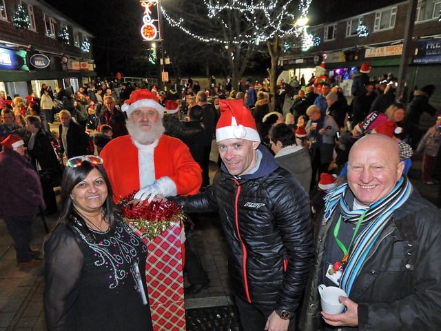 Ladybrook Christmas lights switch on 2018. Ben Birchall along with Alka Bhatt from the Post Office, Santa and Coun. Terry Clay, push the button to light up the Ladybrook shopping parade on Friday night.