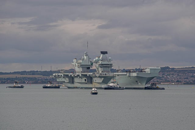 HMS Queen Elizabeth leaves Portsmouth on 9 September 2020. Pictured: View from Still & West Pub, Portsmouth of HMS QE. Picture: Habibur Rahman