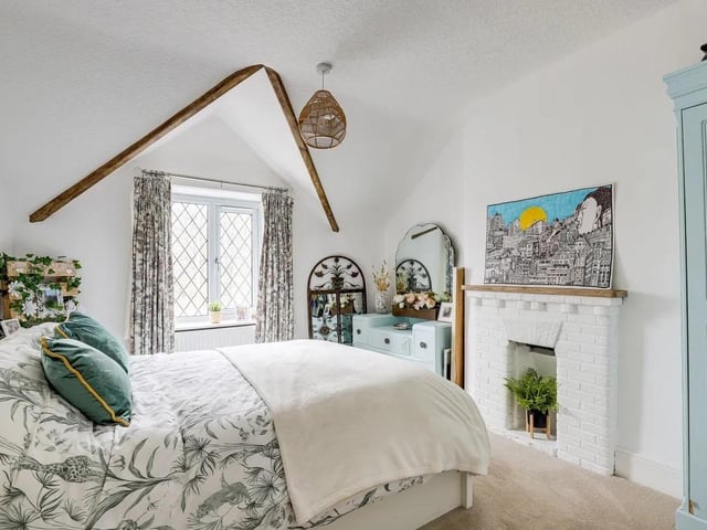 One of three spacious bedrooms in the property.