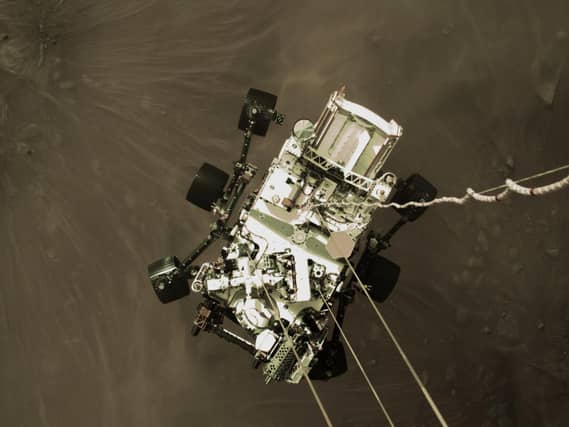 NASA handout photo of the Mars Perseverance rover moments before it touched down on the red planet.